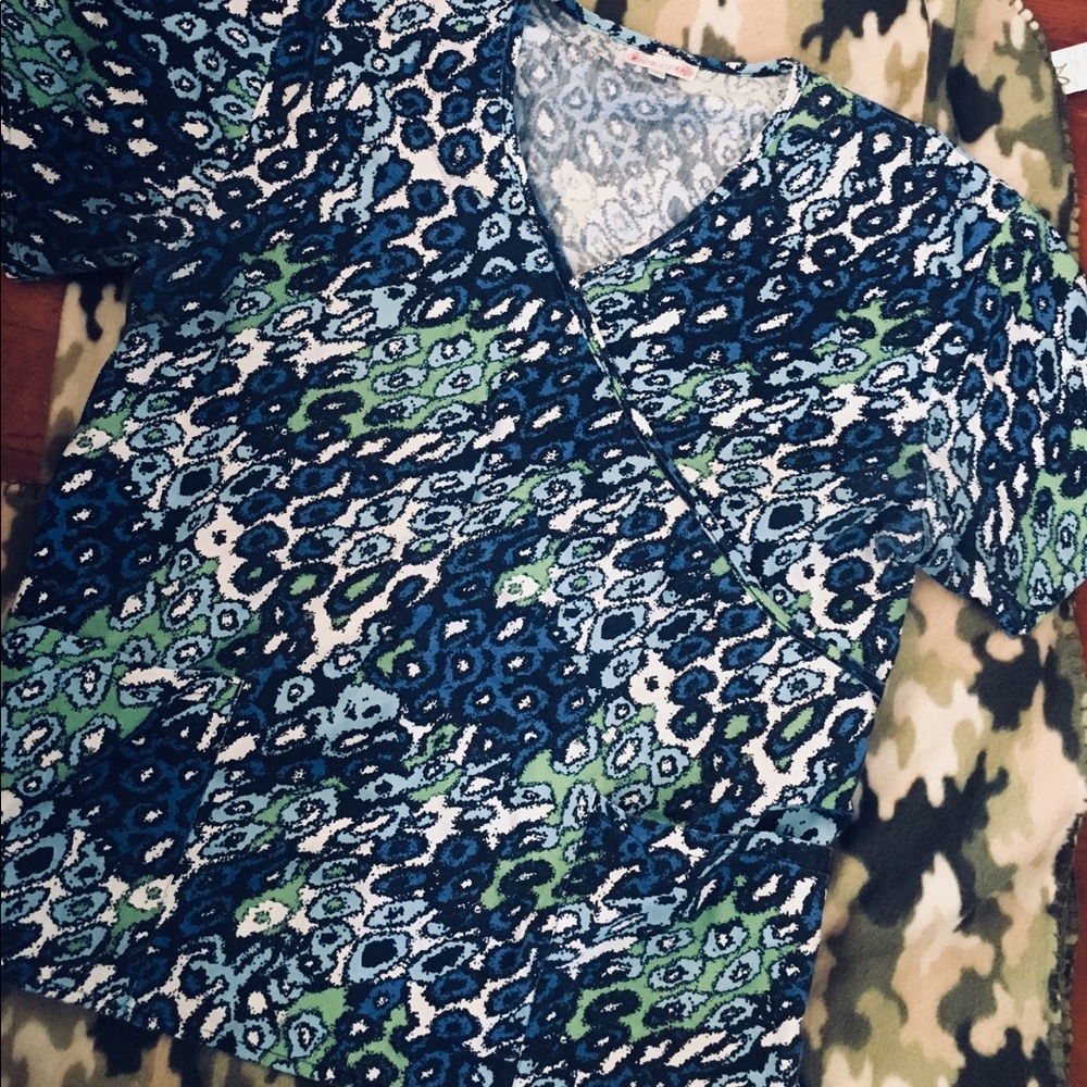 Delta cheetah print scrub top